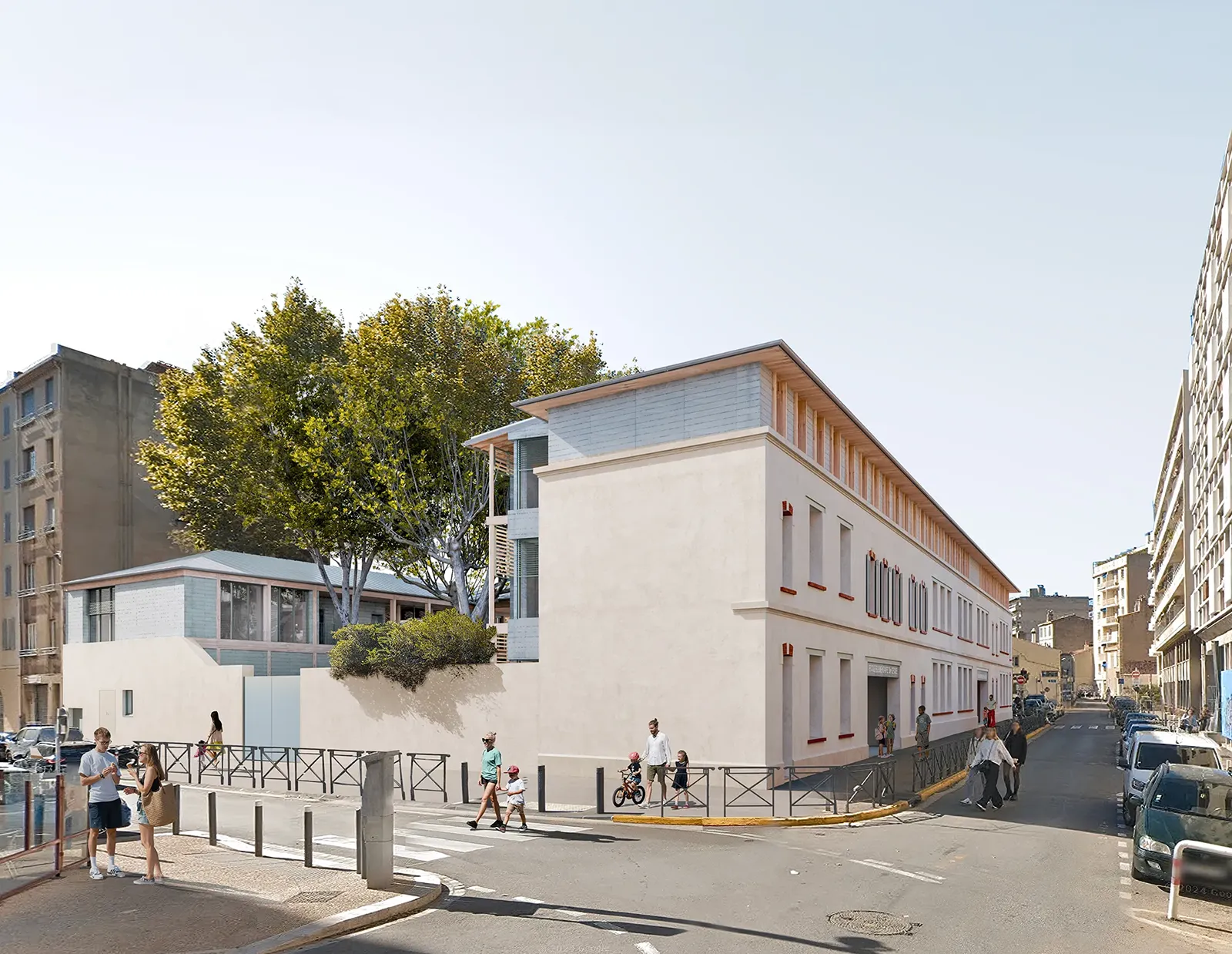 Vue depuis la rue de la surélévation et de l’extension ossature bois de l’école Sainte Cécile à Marseille